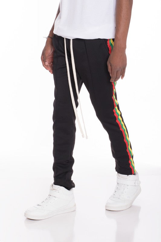 RASTA TAPED TRACK PANTS Smile Sparker