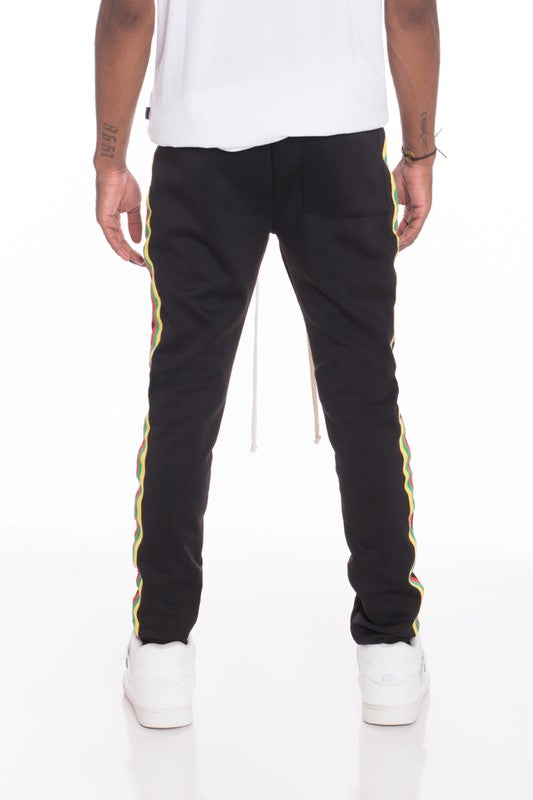 RASTA TAPED TRACK PANTS Smile Sparker